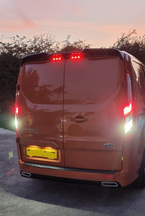 Ford Transit Custom rear view showing bright white LED number plate illumination