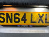 Standard halogen bulb and white LED number plate light output comparison