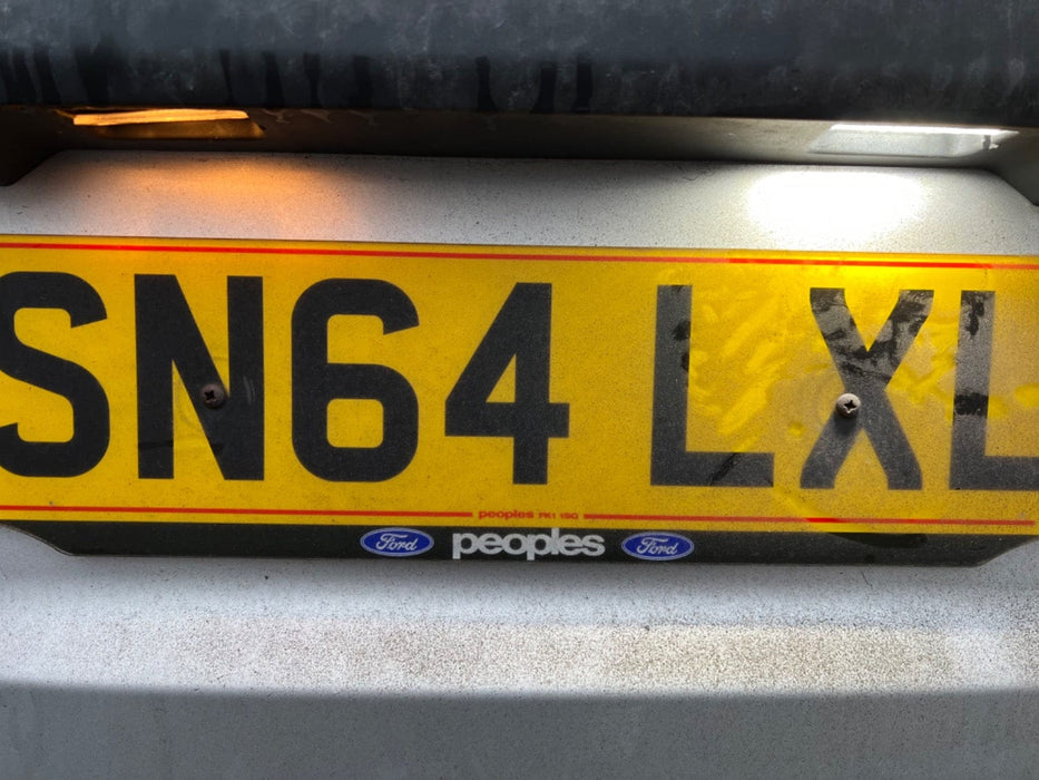 Standard halogen bulb and white LED number plate light output comparison